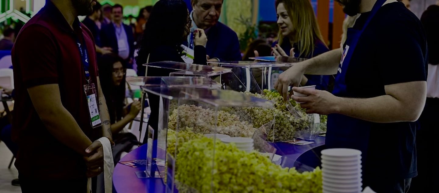 Exhibitor handing out samples